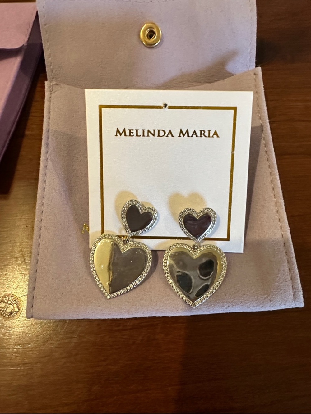 Melinda Maria Silver Tone Mirrored Heart Drop Earrings with Pavé Edges